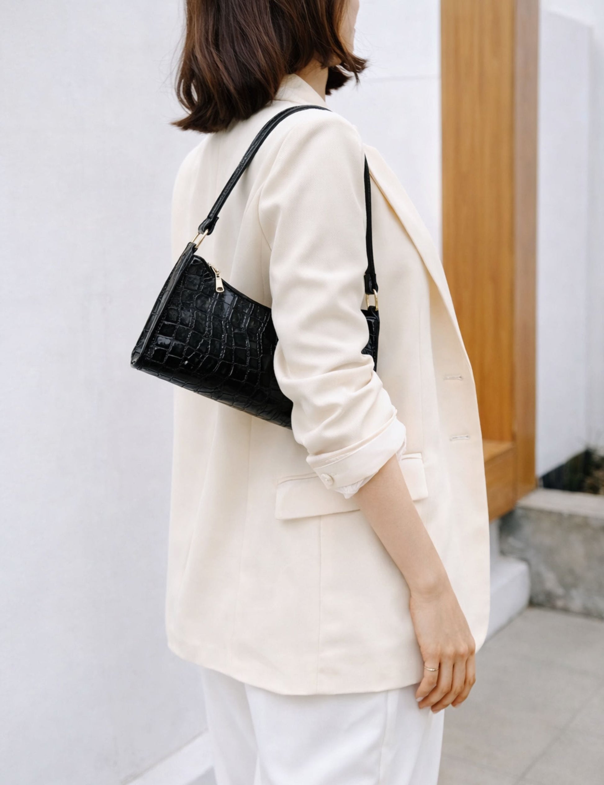 Sac à main noir croco